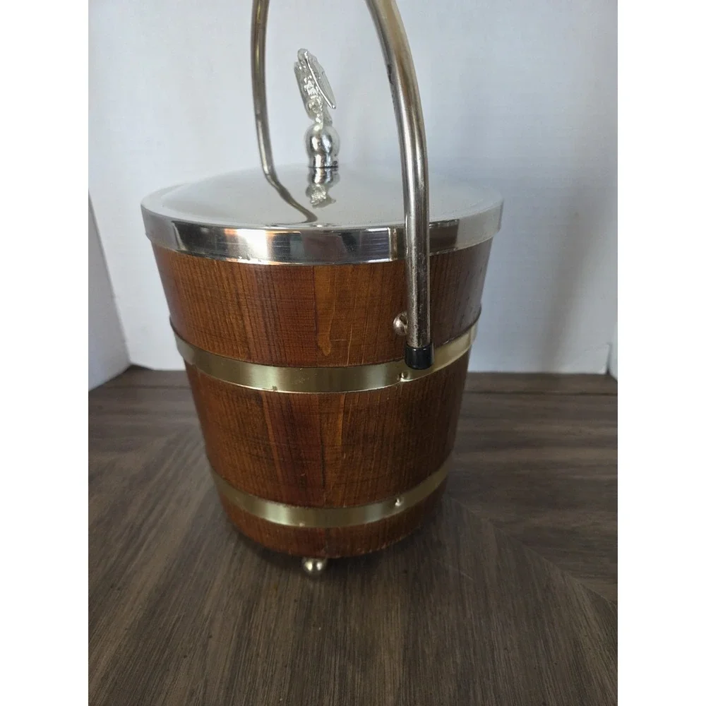 vintage Jerywil wood and brass-accented footed ice bucket from the 1970s